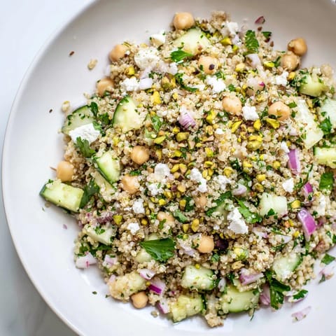 Freshly tossed Jennifer Aniston Salad, a Mediterranean delight with vibrant herbs and toasted nuts.