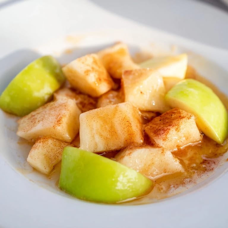 Warm, sweet Slow Cooker Stewed Apples; a comforting aroma promises a delicious, simple recipe.